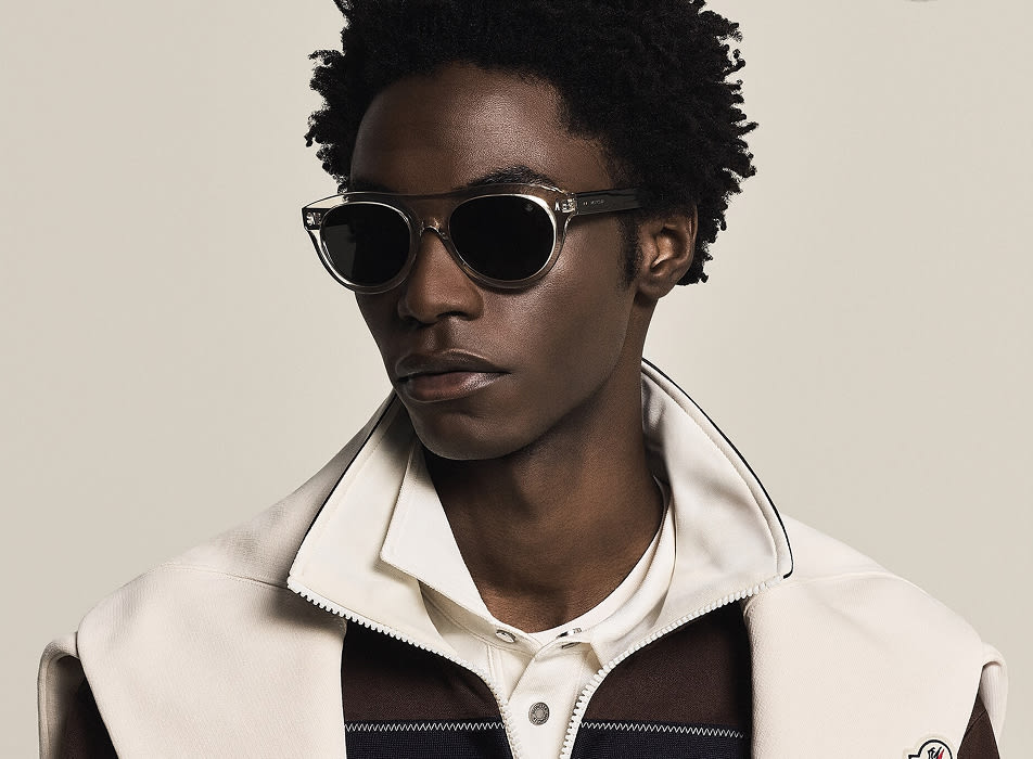 Man wearing Prada sunglasses