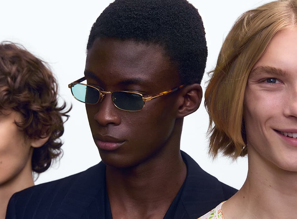 Man wearing Prada sunglasses